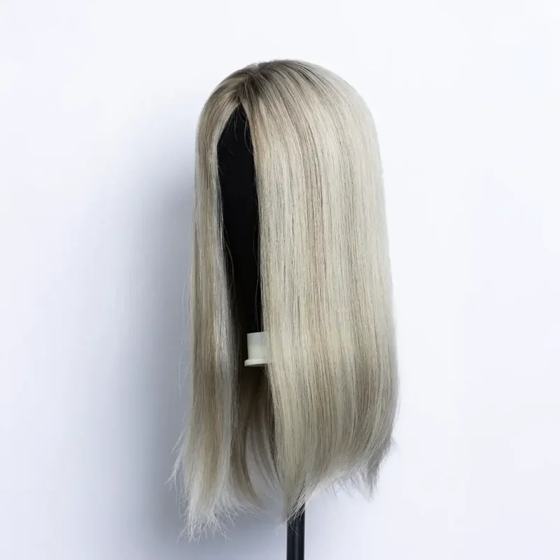 Blonde hair topper on dsplay stand